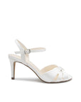 Arista Satin Wide Fit Wedding Shoes – elegant ivory Wide Fit Wedding Shoes crafted in smooth satin, featuring a chic crossover open toe, adjustable ankle strap with buckle, and a slim high heel for sophisticated bridal style.