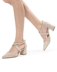 Model wearing Filippa champagne wide fit block heels with pointed toes