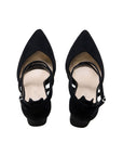 Pair of black microsuede court shoes with pointed toes and ankle straps, top view