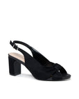 Black microsuede block heel sandal with knotted front and adjustable slingback strap, angled view