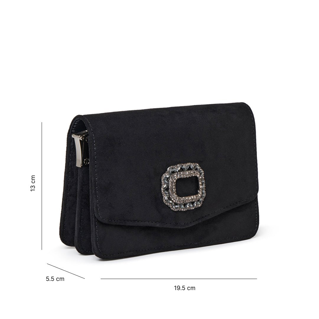 Black occasion clutch bag with soft microsuede finish and detachable chain strap, angled view